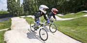 Cyclists with helmets riding